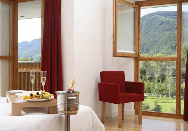 Las mejores habitaciones en Hotel Tierra de Biescas. El entorno más romántico con los mejores precios de Huesca